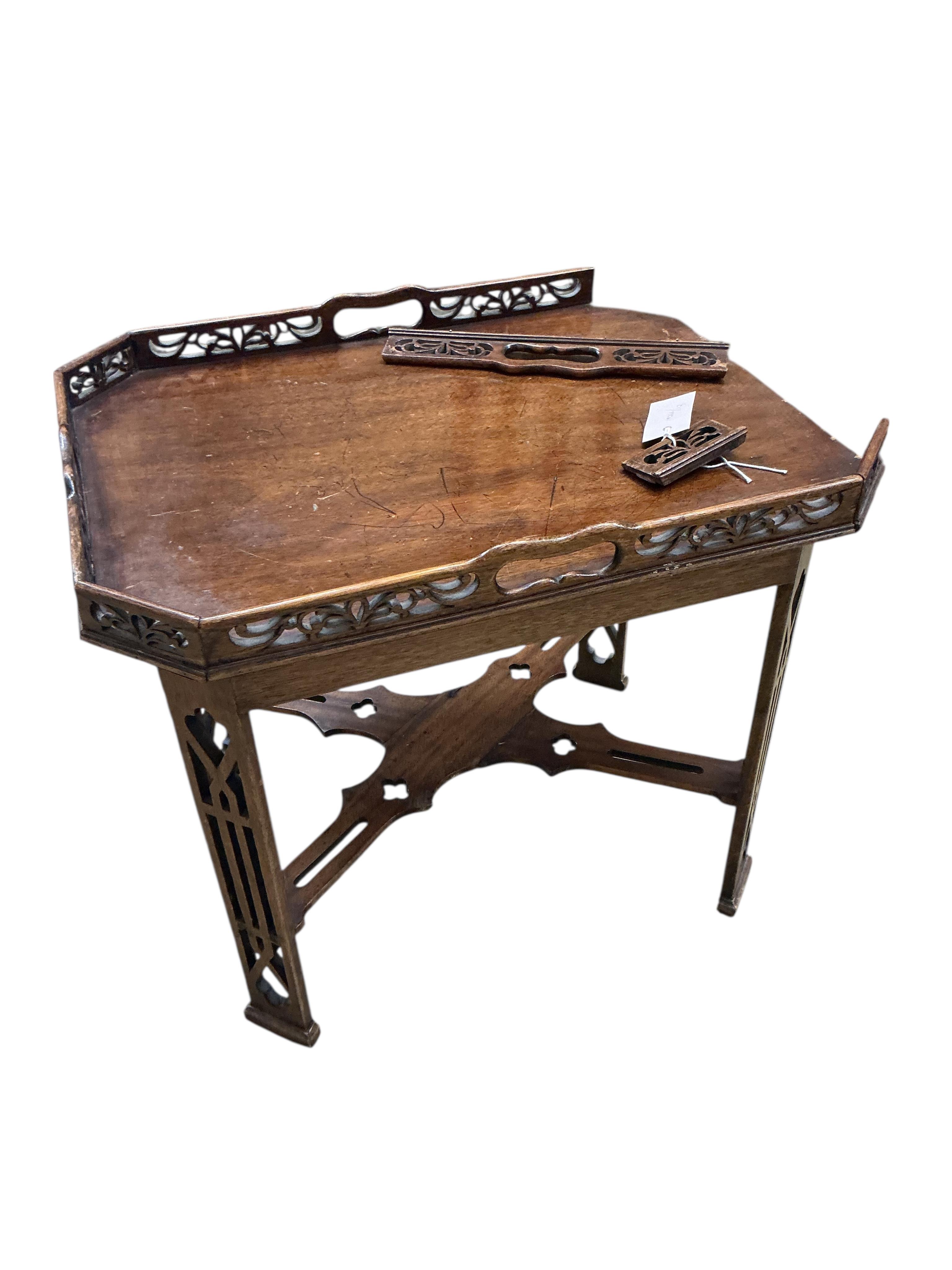 A George III style mahogany silver table with gallery top, in need of restoration, width 54cm, depth 41cm, height 47cm